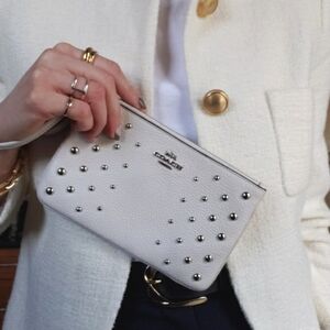 Coach wristlet with studs